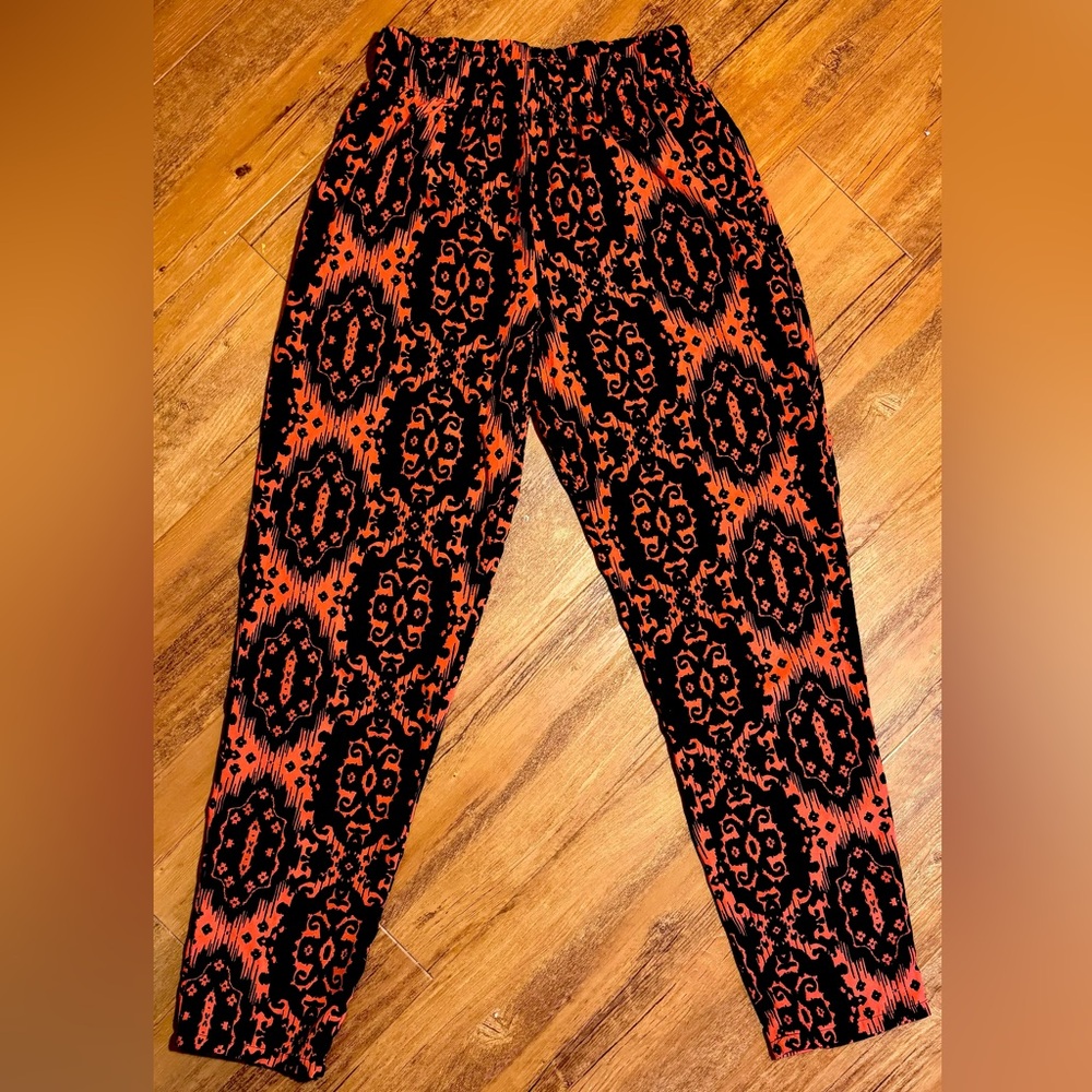 Bold red and black printed pants / trousers